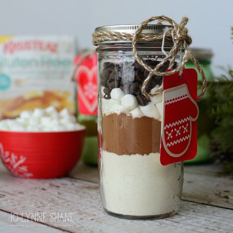 What’s cuter than food gifts in jars? Right? For my last recipe of 2014, we’re going out with a bang. Colleen created these tricked-out Hot Chocolate Pancakes! Yes, I said Hot Chocolate PANCAKES!! These pancakes make an amazing desert or a spectacular special occasion breakfast. The idea came to life with the help of Krusteaz Gluten-Free Buttermilk Pancake […] Jar Breakfast Recipes, Pancakes In A Jar, Brunch Basket, Gingerbread Pancake Mix, Christmas Care Package Ideas, Mason Jar Breakfast Recipes, Strawberry Pancakes Recipe, Hot Chocolate Pancakes, Pumpkin Pancake Mix