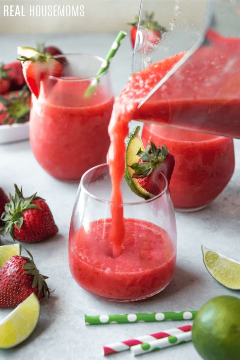 Strawberry & Lime Moscato Wine Slushie - #cocktail #lime #moscato #slush #slushie #strawberry #wine #drinks-recipes #mothers-day-drink #patriotic-drink #recipes #summer-seasonal #realhousemoms Slushie Recipe Blender, White Wine Slushies, Homemade Wine Slushies, Diy Wine Slushie, Wine Slushies Recipe How To Make, Moscato Wine Slushie, Blueberry Green Tea, Moscato Sangria, Wine Slushie Recipe