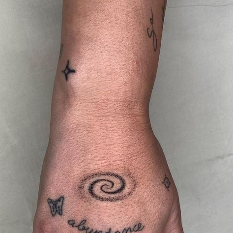 Carlos 🌬️ on Instagram: "The galaxy on Almudena’s hand. Thank you 🌹" Spiral Hand Tattoo, Spiral Tattoo, Stick Poke, Palm Tattoo, Stick Poke Tattoo, Palm Tattoos, Galaxy Tattoo, Weird Tattoos, Poke Tattoo