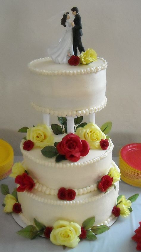 yellow and red rose wedding cake - butter cream frosting. Artificial roses Red And Yellow Wedding Cake, Red And Yellow Wedding, Cake Butter Cream, Red Rose Wedding Cake, Rose Wedding Cake, Yellow Wedding Cake, Wedding Cake Pearls, Butter Cream Frosting, Round Wedding Cakes