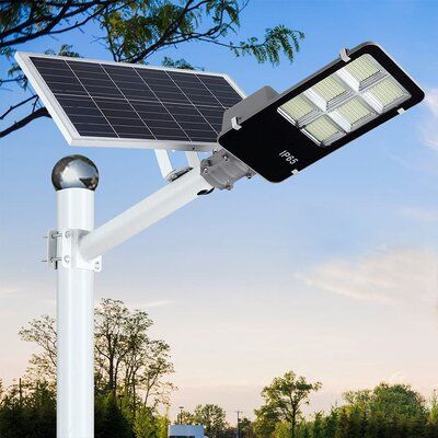 【SUPER BRIGHT & LONG WORKING】468 Super bright LEDs ,have the capability of producing over 300W light to supply lightening and security to your garage, pathway and more. solar street light built-in 36000mAH large capacity lithium battery, which will provide over 3 Night Lighting time after full charged. | Polar LED Solar Street Lights Outdoor, Dusk To Dawn Security Flood Light w/ Remote Control & Pole, Wireless, Waterproof, Perfect For Yard | Wayfair Led Parking Lot Lights, Parking Lot Lighting, Affordable Lighting, Solar Flood Lights, Doors Makeover, Solar Street Light, Street Lights, Light Building, Solar Cell