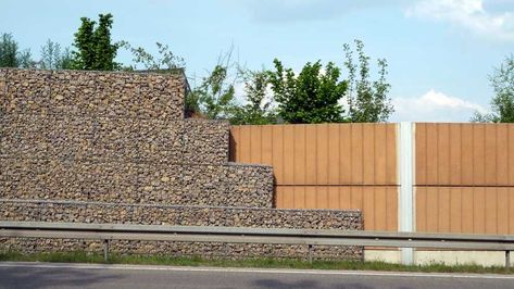 New barriers to reduce #noise #pollution from busy roads   https://uk.motor1.com/news/300533/new-barriers-reduce-noise-pollution/ Sound Barrier Wall, Noise Barrier, Evergreen Landscape, Sound Wall, Sound Barrier, Noise Pollution, Backyard Inspiration, Noise Levels, Surface Area