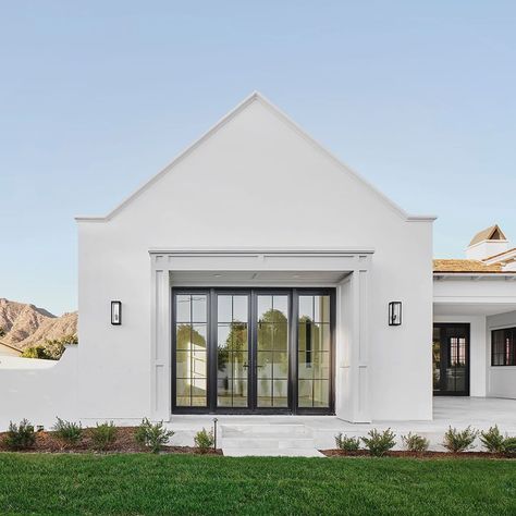 Integrated Design,llc on Instagram: “Details. Understated elegance. Simple shaped gable parapet against the sky. Trimmed pop out defining doors leading from the Master Suite. .…” Gable Wall, Gable Trim, Gable House, Exterior Houses, Pitched Roof, Pop Out, Understated Elegance, Home Reno, The Master