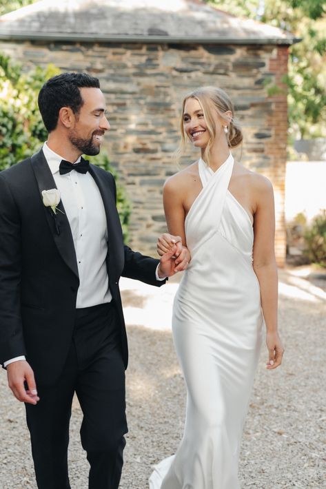 When romance and minimalism collide. @lillykatharina looking effortlessly elegant at her summer wedding in bespoke Chosen by KYHA. Wedding Hairstyles Halter Dress, High Neck Wedding Dress Hairstyle, Simple Wedding Dress Halter, High Neck Satin Wedding Dress, High Neck Halter Wedding Dress, High Neck Wedding Gown, Halter Neck Wedding Dress, Form Fitting Wedding Dress, Chosen By Kyha