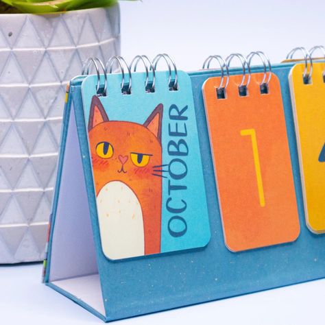 I can't wait to feel slightly judged by this cat the entire month of October! 🤣 #DeskCalendar #stationeryshop #stationery #FlipCalendar #calendar #deskdecor #plannercommunity #PlannerLife Calenders Design Creative, Calander Design Creative, Callender Handmade 2024, Calendar Ideas Design, Calender 2024 Designs, Funky Calendar Design, Flip Calendar, Photoshop Tutorial Graphics, Cute Calendar