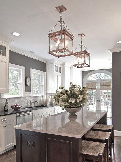 Bright and open. Love the lanterns. Layout it great. Pantry or laundry by the door. Don't like cabinets.  #weightloss #health #weight loss Kitchen Ikea, Kabinet Dapur, Kitchen Chandelier, Classic Kitchen, Sell Your House Fast, Kitchen Farmhouse, Stunning Kitchens, Kitchen Redo, Trendy Kitchen