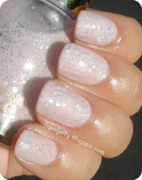 Popular, formerly known as Starry Pink. Popular is a sheer, pale pink polish with fine and medium silver glitter. The glitters submerged in the milky base tend to be white or grey, depending on how much polish is covering it. Milky White Nails With Glitter, Pink Sparkle Top, White Nails With Glitter, Milky White Nails, White Glitter Nails, Nail Time, Pink Polish, Sparkle Top, Sparkle Nails