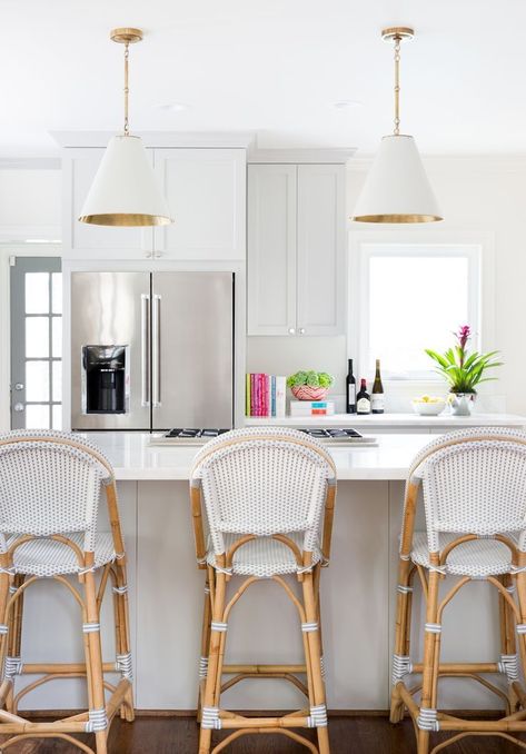 White kitchen with Serena & Lily's Goodman Pendant and Riviera Counter Stools | Image via J Barron Interiors Restauration Hardware, French Bistro Chairs, Preppy Kitchen, Bar Counter Stools, White Bar Stools, Kitchen Counter Stools, Classic Kitchen, French Bistro, Bistro Chairs