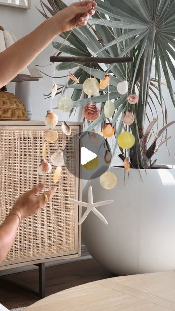 Wind Chimes With Shells, Seashell Ideas Decorations, How To Put A Hole In A Shell, How To Make A Shell Wind Chime, How To Make Holes In Shells, How To Drill Holes In Shells, Diy Shell Wind Chimes, How To Make A Hole In A Sea Shell, Diy Seashell Wind Chime