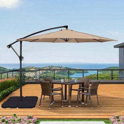 Do you want to entertain outdoors to your heart's content? With this cantilever umbrella, you can relax and entertain in a variety of outdoor locations without being bothered by sun or rain. It can cover up to 95 square feet, providing you with plenty of space for outdoor entertaining. | Latitude Run® Cantilever Offset Outdoor Patio Umbrella w/ Weighted Base Included 120.0 x 120.0 in | C111095306 | Wayfair Canada Japanese Bbq Grill, Japanese Bbq, Umbrella Patio, Cantilever Patio Umbrella, Offset Umbrella, Cantilever Umbrella, Sun Umbrella, Outdoor Umbrella, Outdoor Entertaining