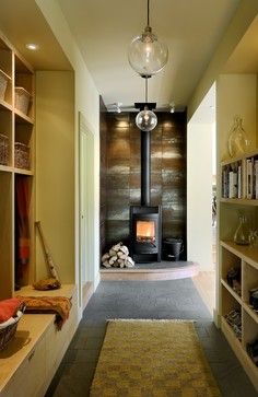 Sand and Sisal: Marvelous Mudrooms: Big & Small Space Solutions. contemporary mudroom Fireplace Oven, Small Wood Burning Stove, Home Fix, Small Space Solutions, Ideas Pictures, Fireplace Design, Wood Burning Stove, Own Home, Wood Stove