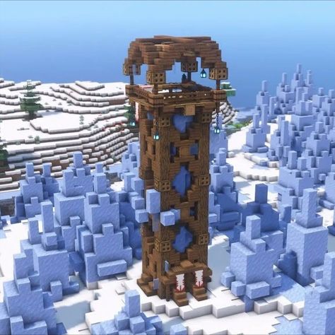 If you're looking for a nice watch tower build in Minecraft, make sure this beautiful creation is on your watch list! This Ice Spike Watch Tower in Minecraft features a well-structured tower with a very pleasing exterior design from the base up to the highest point of this tower build. You can also use this as a starter house because of its many possible features. So better check it out now. Tower In Minecraft, Build In Minecraft, Minecraft House Ideas, House In Minecraft, Starter House, Tower House, Minecraft House, Watch Tower, Exterior Design