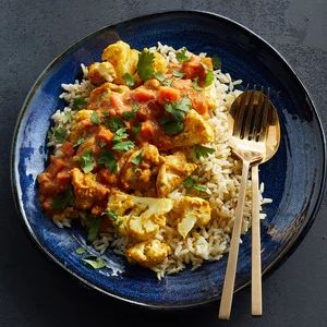 Cauliflower Chicken Curry Recipe | EatingWell Cauliflower Chicken, High Protein Dinner, Chicken Cauliflower, Protein Dinner, Cauliflower Curry, Chicken Curry, Curry Chicken, Chicken Dinner Recipes, Chicken Thighs