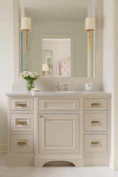 Transitional Family Room Reveal - Randi Garrett Design Sconces On Bathroom Mirror, Bathroom Mirror With Sconces On Mirror, Master Make Up Vanity, Creamy White Bathroom Vanity, Traditional White Bathroom Vanity, Traditional Vanity Bathroom, Master Bath Hardware, Sconces In Mirror Bathroom, Ivory Bathroom Vanity