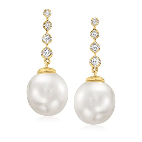 These drop earrings are just ravishing. From linear drops of glittering .17 ct. t.w. round brilliant-cut diamonds suspend 10-10.5mm cultured South Sea pearls. Pair them with your formal or casual attire! Crafted in polished 14kt yellow gold. Hanging length is 1 1/8". Post/clutch, diamond and white pearl drop earrings. South Sea pearls are unique and may vary. Pearl Birthstone, Natural Gold, Sea Pearl, Sea Pearls, South Sea Pearls, Diamond Drops, Pearl Color, Diamond Drop Earrings, Casual Attire