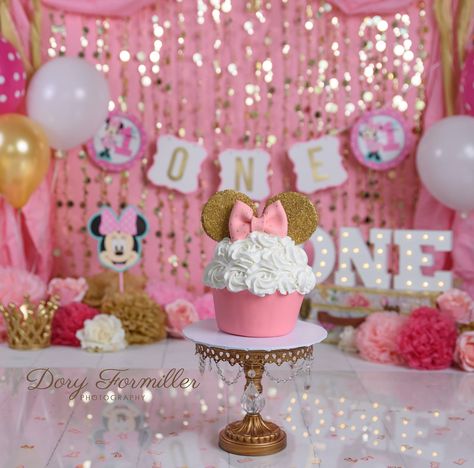 Pink and gold cake smash, Minnie Mouse and floral Minnie Mouse Birthday Photoshoot, Minnie Smash Cake, Mini Mouse Smash Cakes, Minnie Mouse Birthday Cakes Pink And Gold, Minnie Mouse Smash Cake 1st Birthdays, Pink And Gold Minnie Mouse Party, Minnie Mouse Cake Smash, Minnie Mouse 1st Birthday Pink And Gold, Minnie Mouse Pink Cake Smash