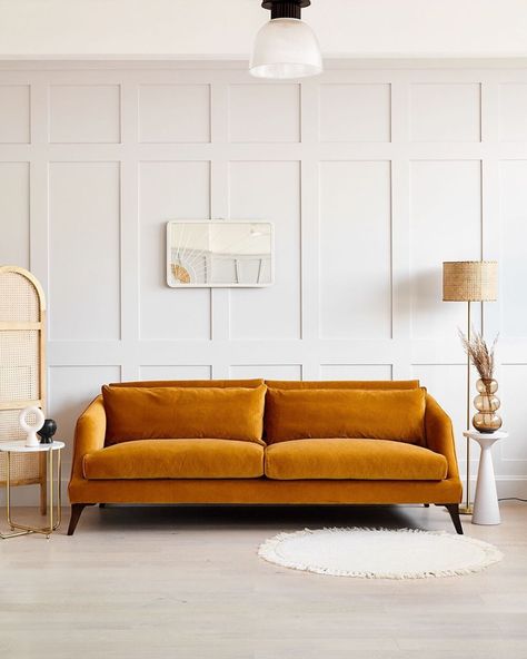 Orange velvet sofa