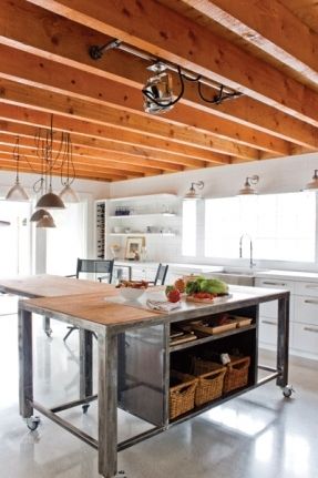 I love this steel-framed island on castors, with open shelving. Perfect for an industrial-style kitchen, and very practical. The lighting fixture in the foreground is an antique ship searchlight. Kitchen Island On Casters, Kitchen Industrial, Industrial Kitchen Island, Kitchen Island On Wheels, Industrial Kitchen Design, Furniture Casters, Industrial Style Kitchen, Industrial Kitchen, Trendy Kitchen