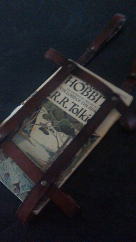 My book holster. You can attach it to your belt and carry books around, I'm such a nerd! Diy Book Holster, Book Holder Belt, Book Belt Holder, Book Holster Belt, Book Holster, Druid Cosplay, Satyr Costume, Elf Druid, Belt Holder