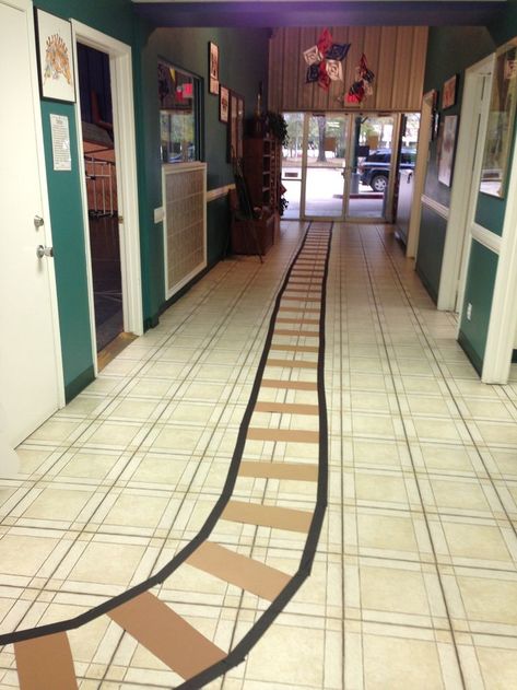 Polar express day. Train track on floor at school. Maybe a butcher paper train on the wall too? Or one they can walk through? Diy Train Tracks On Floor, Polar Express Day, Polar Express Christmas Party, Polar Express Theme, Polar Express Movie, Polar Express Party, Paper Train, Ward Christmas Party, Polar Express Train