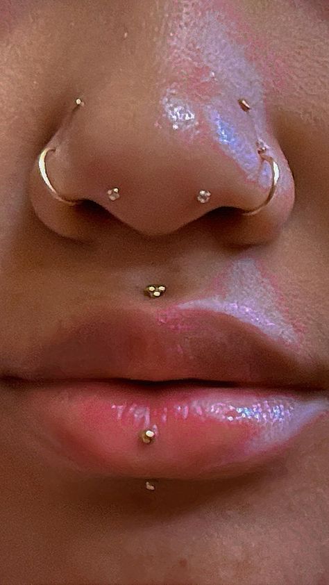 Interesting Nose Piercings, Front Nose Piercing, Double Nose Piercing On Both Sides, Medusa Piercing Lip, Nose Ring On Both Sides, Facial Piercings Black Women, Nose Piercing Set Up, Unique Face Piercings, Nose Double Piercing