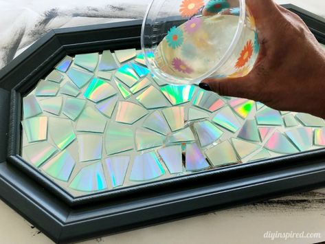 Resin Mosaic Tray with Recycled CDs and DVDs - DIY Inspired Diy Resin Table Top Ideas, Resin Trays And Coasters, Cd Mosaic Table, Cd Mosaic Mirror, Resin Collage Tray, Epoxy Tray, Resin Mosaic, Resin Rolling Tray, Diy Resin Tray