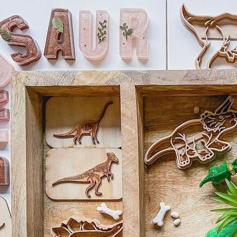 Jenn • Rumble & Rour on Instagram: "🦖 These wooden dinosaur stamps from @nature.based.toys were supposed to be saved for when Ro is a little older but he saw me unpacking them. He was so fascinated I decided to set up this #invitationtoplaydough using pieces from our @momthemage Christmas tree kit. He liked the wooden stamps so much he played with them again later during our 1-on-1 quiet time. I included various other loose parts, @safariltd dinosaurs for making tracks, @jadatoys mini die-cast Jurassic park cars, & gorgeous letters from @glitterhandsclub so I could slip in some alphabet learning! #learningthroughplay #playtolearn #playbasedlearning #themebasedplay #letthembelittle #toddleractivities #sensoryplaytime #sensoryplayideas #playislearning #creativeplayideas #creativeplay #sen Jurassic Park Car, Dinosaur Stamps, Christmas Tree Kit, Playbased Learning, Invitation To Play, Wooden Stamps, Quiet Time, Learning Through Play, Play To Learn