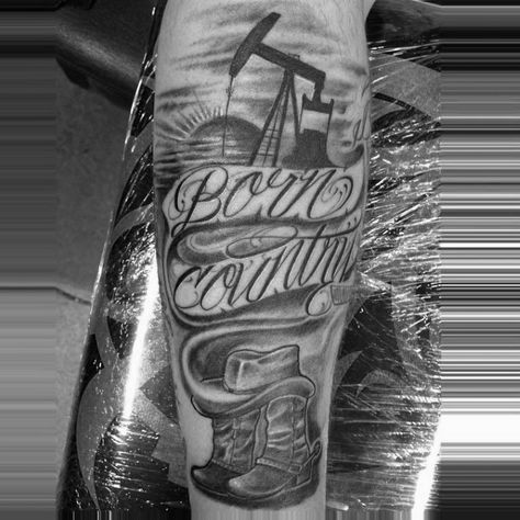 Born Country Cowboy Grey And Black Tattoo With Script For Men Oklahoma Tattoo For Men, Country Tattoos For Men Cowboys, Country Music Tattoos Men, Cowboy Western Tattoos For Men, Outlaw Tattoos For Men, Country Music Tattoos For Women, Country Boy Tattoos, Country Tattoos For Men, Country Tattoos For Guys