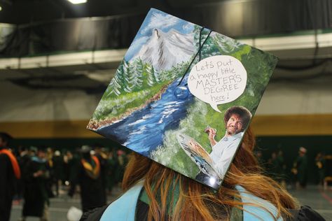 Bob Ross graduation cap Bob Ross Graduation Cap, Associates Degree Graduation, Art Graduation Cap, Graduation Cap Pictures, Cap Decoration Graduation, Graduation Diy Decorations, College Grad Cap Ideas, Cap Graduation, High School Graduation Cap