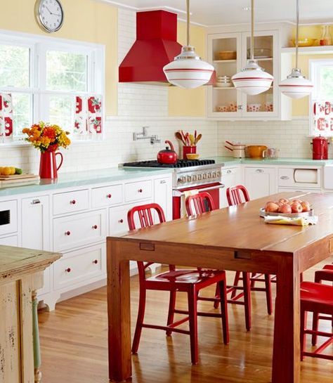 design ideas for a colorful retro kitchen from CountryLiving.com | Love the red and yellow! All drawers on the bottom instead of awkward shelves. Green Countertops, Yellow Kitchen Designs, Farm Style Kitchen, Red Chairs, Diner Decor, Casa Vintage, Deco Retro, Yellow Kitchen, Red Kitchen