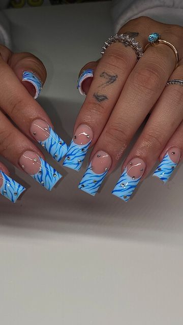 Blue Tiger Nails, Sza Singer Nails, Baby Blue Birthday Nails, Blue Zebra Nails, Blue Y2k Nails, Baby Blue French Tip Nails, Blue Birthday Nails, Zebra Acrylic Nails, Hollywood Nails