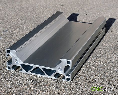 Was goofing off on Reddit the other day and saw a new extrusion rail boasting better strength for longer runs. https://www.reddit.com/r/hobbycnc/comments/4316n8/new_aluminum_extrusion_rail_for_super_sized/  The extrusion looks like an inverse MakerSlide with the v-channels running internally with bracing for torsion torque. The beefiness of this looks intriguing and given the vchannel could be a compliment for extending the X or Y axis on the x-carve.      In the thread someone suggested flippin Sigma Profile, Ute Camper, Aluminum Extrusion Design, Homemade Cnc, Heavy Duty Drawer Slides, X Carve, Cnc Machine Design, Diy Router, Workbench Designs