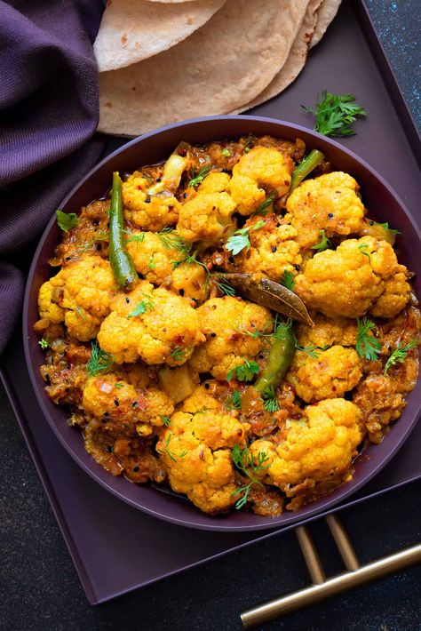 The Best Achari Gobi Recipe | Achaari gobi is a delicious and spicy Indian dry cauliflower curry made using flavorful pickling spice mix - Achari Masala. It's super simple, easy to make and perfect for a quick weeknight dinner. Serve with roti, paratha or rice for a hearty Indian meal! Gobhi Recipe, Gobi Masala, Gobi Recipe, Gobi Recipes, Curry Recipes Vegetarian, Indian Meal, Mexican Rice Recipes, Marinated Tomatoes, Tomato Salad Recipes