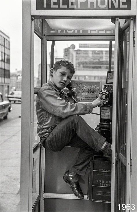 Boy in telephone booth, Boston, 1963. Old Telephones, Old Phones, Telephone Booth, Oldies Music, Phone Booth, Old Phone, Frozen In Time, Telephones, Pay Phone