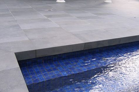 Glass mosaic tiles are incredibly popular Bluestone Paving, Pool Tile Designs, Coping Tiles, Pool Paving, Pool Pavers, Swimming Pool Decks, Pool Finishes, Swimming Pool Tiles, Pool Renovation