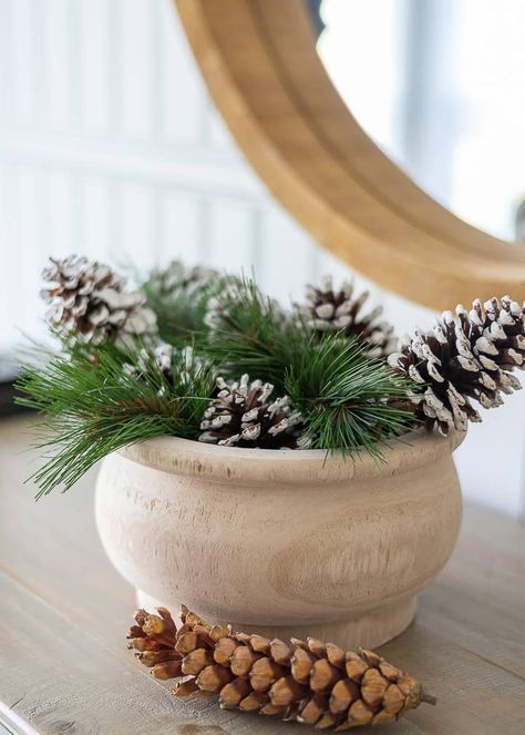 Fresh and simple winter decorating ideas for your home. #winterdecorideas #winterdecorafterchristmas #winterdecorationsdiy Natural Christmas Table Centerpieces, Winter Sideboard Decor, Christmas Decor Ideas For Shelves, Winter Coffee Table Decor, Decorating For Winter, Diy Winter Decorations, After Christmas Winter Decor, Winter Bowl, Winter Mantel Decor