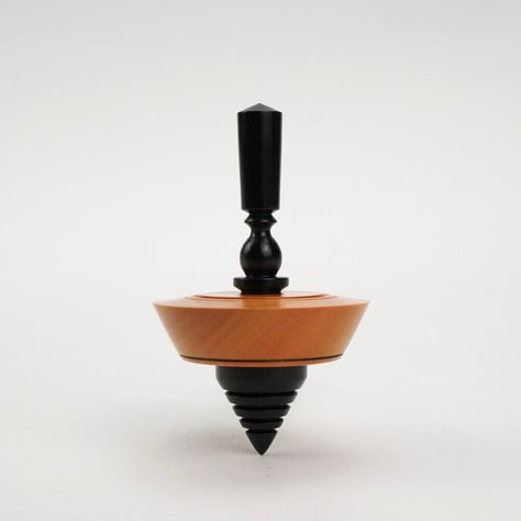 This Tops item by HiKoDesign has 77 favorites from Etsy shoppers. Ships from Slovenia. Listed on Mar 18, 2024 Spinning Tops Design, Lathe Woodworking Projects, 1940s Home Decor, Wood Turning Ideas, Extraordinary Design, Spinning Tops, Metal Lathe, Lathe Projects, Center Of Gravity