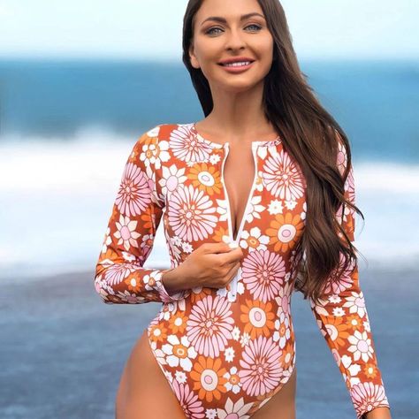 Floral Print Zip Front Long Sleeve One Piece Surf Swimsuit Product Name:Zip Front Long Sleeve One Piece Surf Swimsuit Fabric composition: 88% polyester 12% spandex. Weight: 400g/0.9lb. Size: S, M, L, XL Color:Floral Print Package contains: One Piece Swimsuit x1 One Piece Style:Zip Front Long Sleeve One Piece Garment Care: Wash by hand and dry. Coldwater is recommended. Do not use bleach. $28.99 SKU: BS202188-Floral Print-S More on site https://shareasale.com/r.cfm?b=2577150&u=3629153&m=155990... Triathlon Suit, Surf Swimsuit, Camo Dress, Swimsuit Fabric, Long Sleeve Swimsuit, Cut Out Swimsuits, Swimwear Tankini, Daisy Print, Performance Outfit