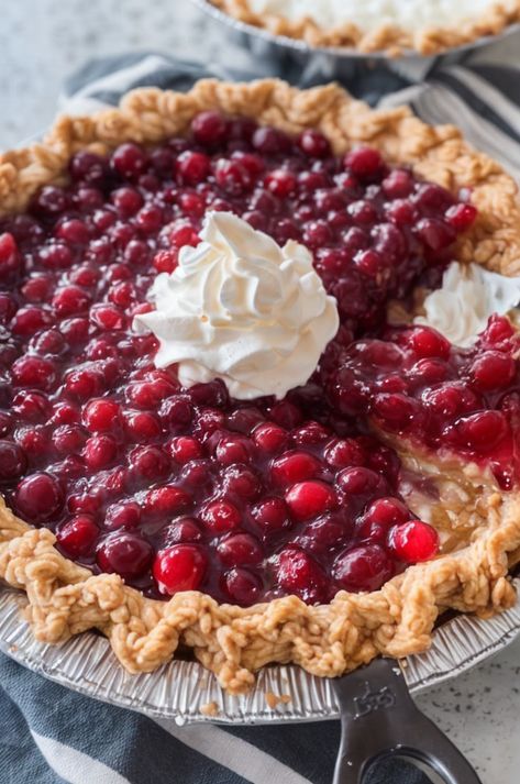 Indulge in this seasonal delight! Our Cranberry Pie combines tart cranberries with a sweet, flaky crust for a fall favorite. Perfect for holiday gatherings! #CranberryPie #FallDesserts #HolidayBaking #PieRecipe #AutumnTreat Nantucket Christmas Cranberry Pie, Cranberry Dishes, Cranberry Tart Recipe, Holiday Pie Recipes, Cranberry Pie Recipes, Holiday Pies Recipes, Premade Pie Crust, Apple Cranberry Pie, Cranberry Tart