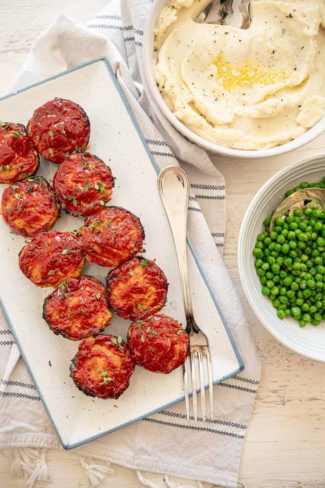 Turkey meatloaf muffins on a platter with a bowl of mashed potatoes and another one with peas next to it. Healthy Turkey Meatloaf, Sneaky Veggies, Turkey Meatloaf Healthy, Turkey Meatloaf Muffins, Meatloaf Muffins, Healthy Turkey, Turkey Meatloaf, Muffin Pans, Baking Tips