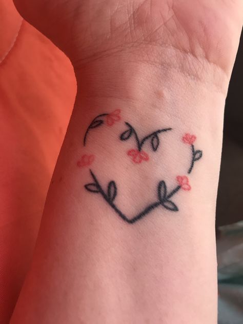 Small heart wrist tattoo, one flower for each daughter ❤️ Small Heart Wrist Tattoo, Open Heart Tattoo, Small Heart Tattoo, Heart Flower Tattoo, Small Wave Tattoo, Heart Tattoo Wrist, Small Heart Tattoos, Cool Wrist Tattoos, Flower Wrist Tattoos