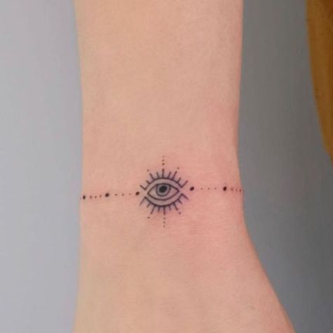 Xenia Moschopoulos on Instagram: "Permanent evil eye bracelet ? Yes pls" Evil Eye Tattoo Bracelet, Greece Evil Eye Tattoo, Henna Designs Evil Eye, Eye Henna Tattoo, Evil Eye Tattoo Ideas Women, Evil Eye Bracelet Tattoo, Evil Eye Wrist Tattoo, Simple Evil Eye Tattoo, Evil Eye Henna