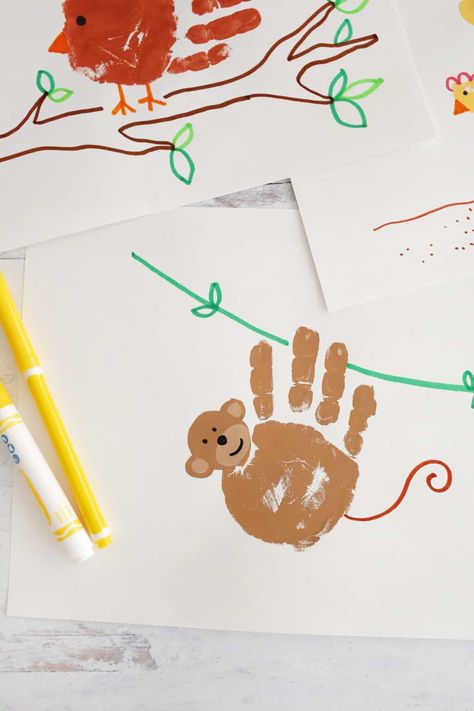 10 Handprint Animal Crafts That Kids Will Love! - Childhood Magic Handprint Animal Crafts, Handprint Animals For Kids, Animal Handprint Art, Handprint Animals, Hand Print Animals, Zoo Crafts, Zoo Animal Crafts, Prek Crafts, Zoo Art