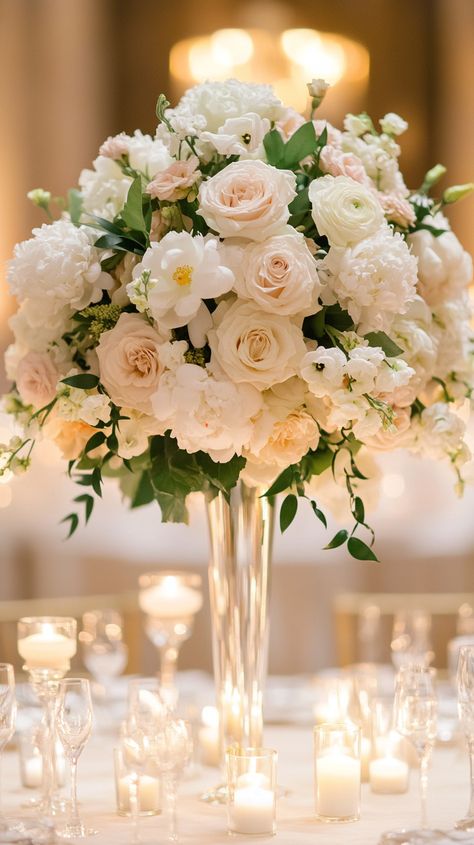 Dreaming of an Elegant Prague Ballroom Wedding? 🌹✨ Experience timeless romance with luxurious decor, lush florals, and warm candlelight. Let us capture your unforgettable moments! 

#Midjourney #PragueWedding #WeddingVideographer #TimelessRomance Pale Yellow And White Wedding Flowers, Champagne Floral Arrangements, Elegant Wedding Flower Arrangements, White And Champagne Wedding, Wedding Timeless, Luxurious Decor, Elegant Wedding Flowers, Barcelona Wedding, Spring Wedding Decorations