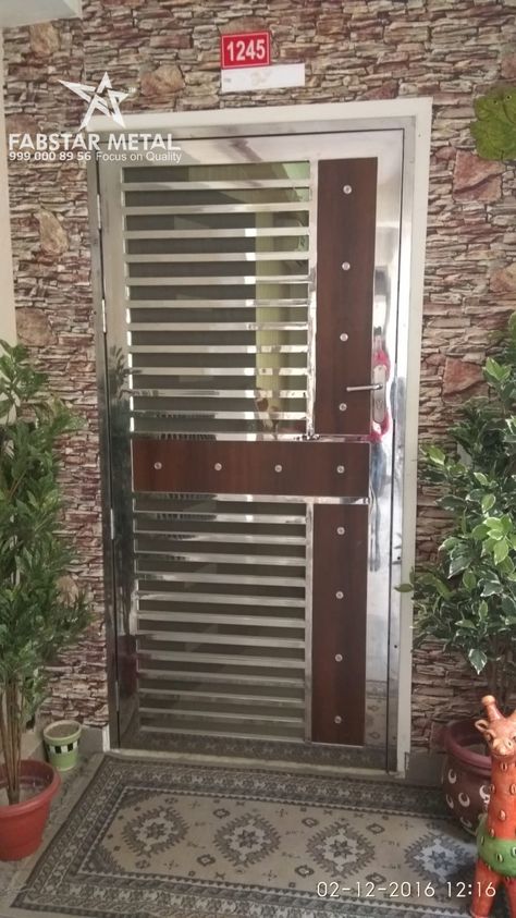 Still Door Design, Stainless Steel Main Door Design, Main Steel Door Design Entrance, Stainless Steel Safety Door Design, Steel Safty Door Design, Main Door Steel Grill Design, Ss Safety Door Design, Ss Door Design Modern, Stainless Steel Door Design Entrance