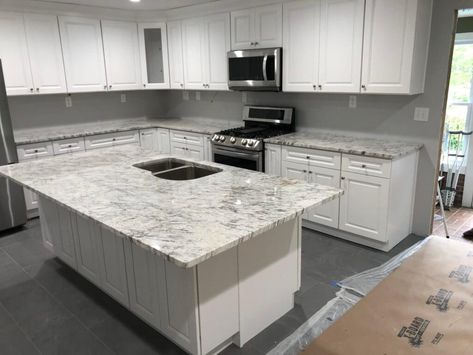 15 Trending White Granite Countertops Ideas in 2023 River White Granite Countertops, Light Colored Granite, Super White Granite, Light Granite Countertops, Cost Of Granite Countertops, White Ice Granite, River White Granite, White Granite Colors, White Granite Kitchen