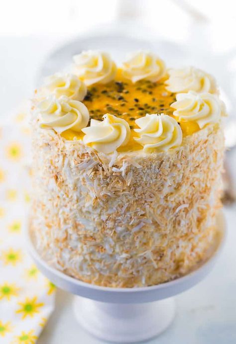 A tropical delight, this passionfruit coconut layer cake is bursting with the sweet and tart flavors of coconut and passionfruit. Coconut Cake Design Ideas, Coconut Cake Design, Coconut Cake Decoration Ideas, Coconut Wedding Cake, Passion Fruit Filling, Coconut Cake Decoration, Coconut Birthday Cake, Baking Activities, Coconut Layer Cake