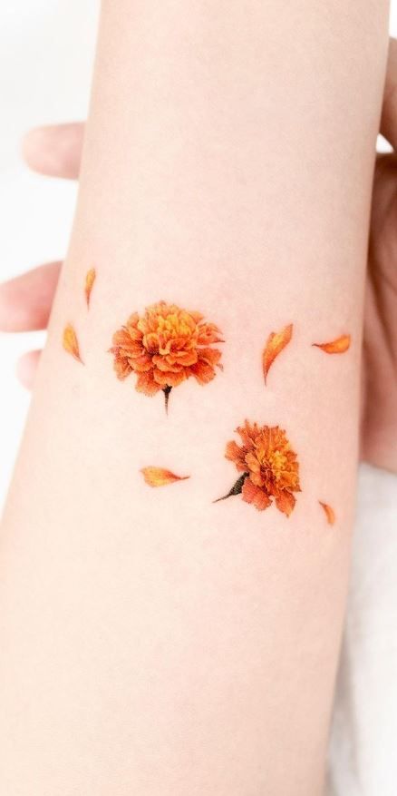 Most Meaningful Tattoos For Women, Marigold Small Tattoo, Mexican Marigold Flower Tattoo, Marigold Spine Tattoos For Women, Marigold Shoulder Tattoos For Women, Marigold Ankle Tattoo, Yellow Marigold Tattoo, Marigold Petals Tattoo, Orange Carnation Tattoo