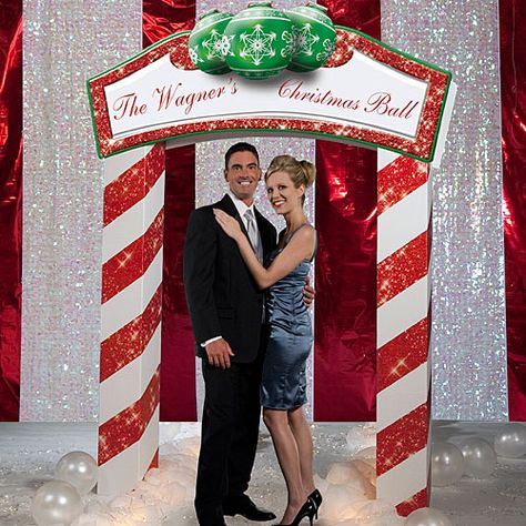 Use the cardboard North Pole Arch as the entrance to your Christmas Party or group your guests under the ornament accented sign for pictures. Each of these 3D arches is approximately 7' wide x 9' high x 1' deep and features a personalized sign atop two glittery red and white candy cane striped columns. The North Pole Arch's sign can be personalized with 2 lines (30 characters each line) of your own special text. Assembly required. Candy Cane Party, Large Party Props, Prek Christmas, North Pole Party, Christmas Extravaganza, Christmas Party Candy, Christmas Arch, Christmas Lollipops, Christmas Photo Booth