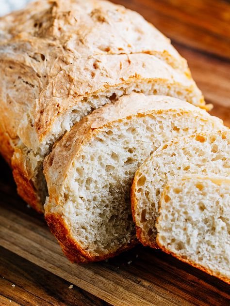 Fluffy white peasant bread with a buttery crust sliced and ready to eat. Peasant Bread Recipe, Baking Bread At Home, Beer Bread Easy, Peasant Bread, Dutch Oven Bread, No Yeast Bread, How To Store Bread, Clam Recipes, Beer Bread